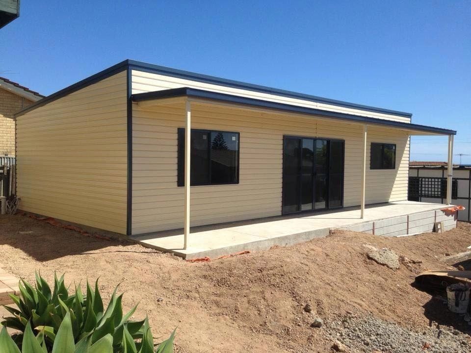 Modern modular building with black frame windows